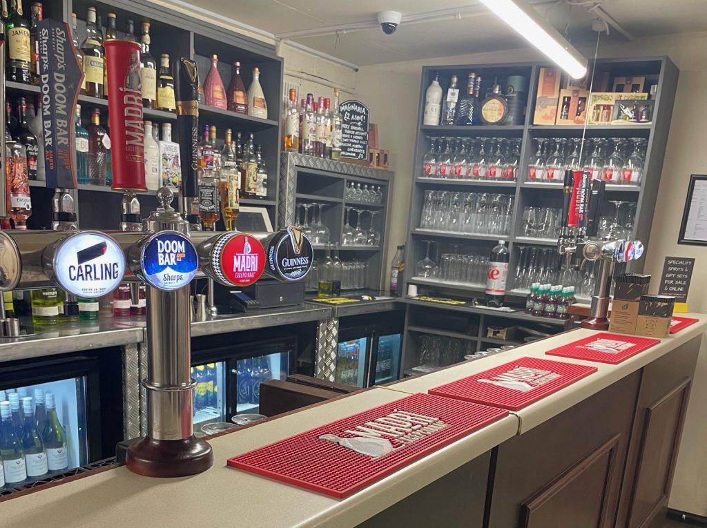 A photograph of the bar at Horton Village Hall. Offering a selection of beers, wines and spirits, Horton Village Hall's bar is ideal for events and private functions alike.