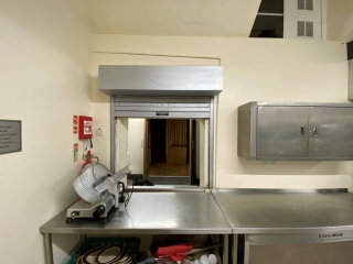 The commercial-style kitchen at Horton Village Hall includes a serving hatch to assist with quickly serving a large number of guests. Alternatively, a buffet could be laid out in the Hugh Sleigh room, which is conveniently accessed from the kitchen.